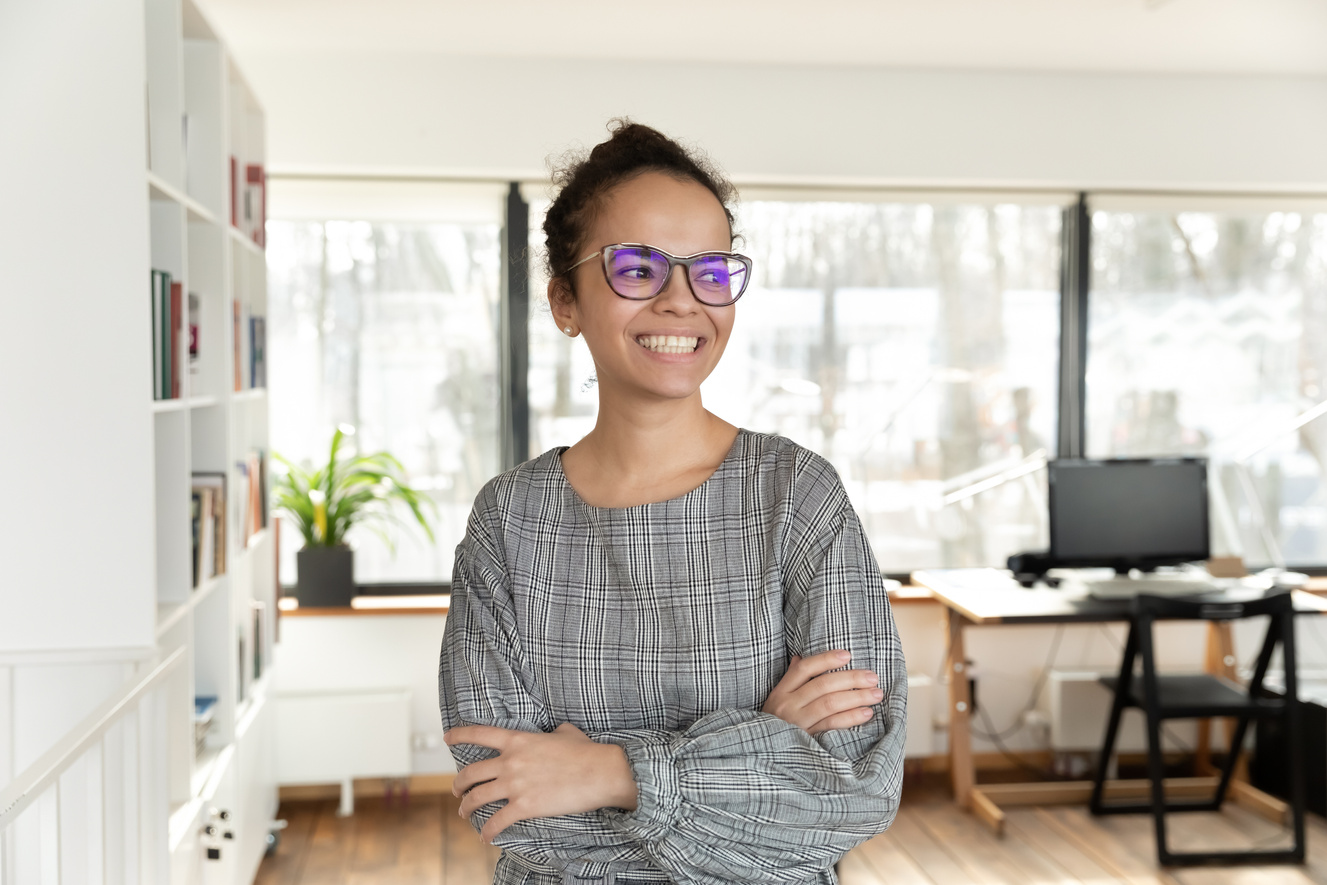 Happy Businesswoman in Eyeglasses Visualizing Future